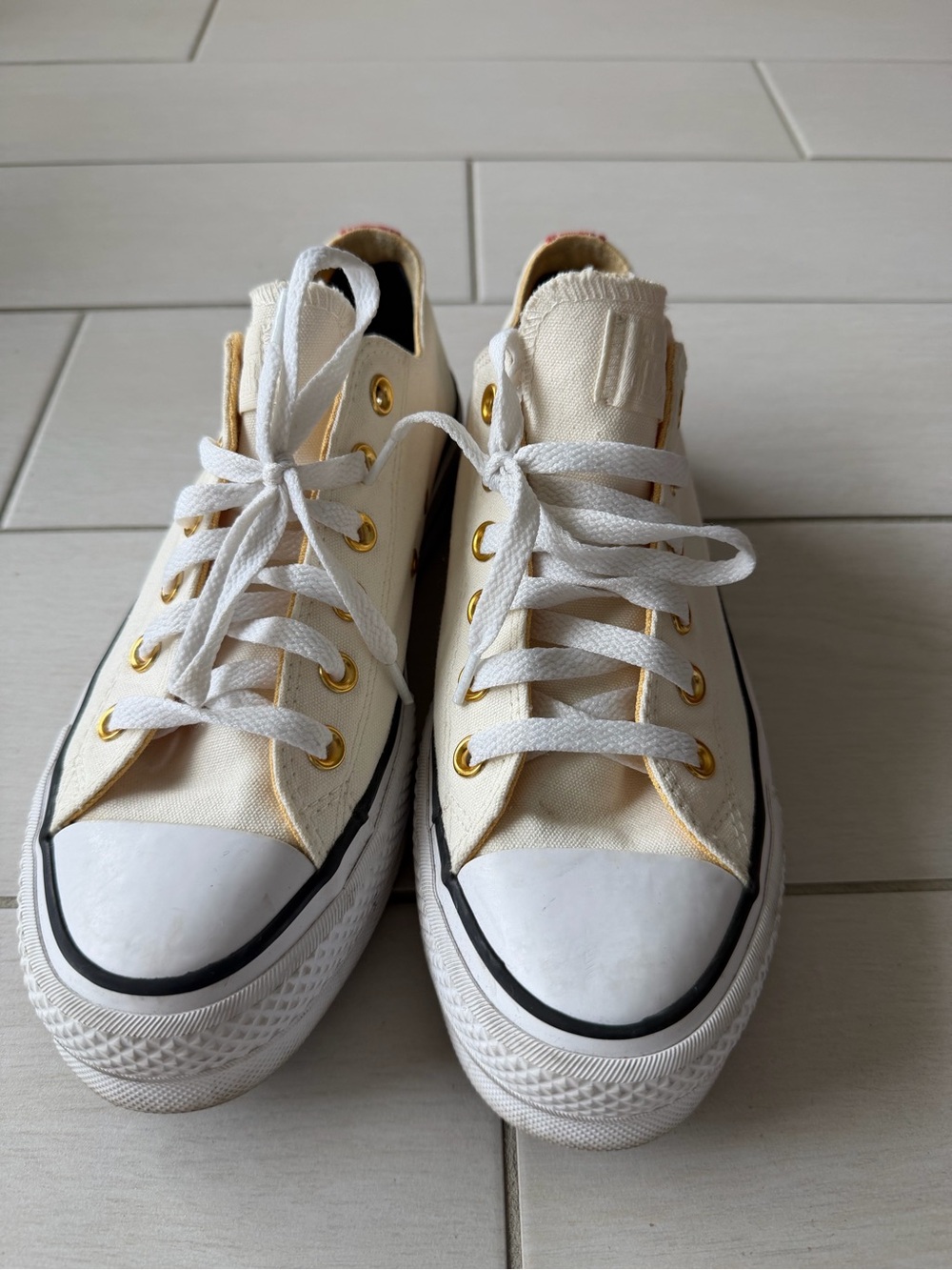 Converse Low-Top Sneakers in Cream with Yellow Lining